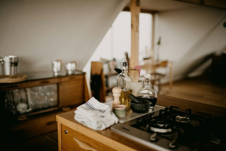 Organized kitchen counter showing essential tools for how to stock a kitchen from scratch